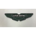A modern painted cast iron sign inscribed "Aston Martin",