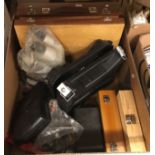 A box of assorted hand tools to include a Parkside cordless grinder, a box of assorted knives, etc,