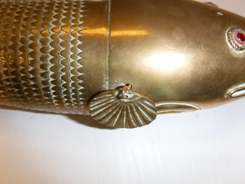 An Eastern brass articulated fish with red enamelled eyes, 46. - Image 16 of 16