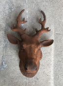 A modern cast iron figure of a Stag's head,