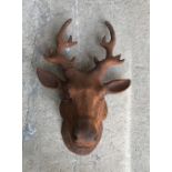 A modern cast iron figure of a Stag's head,
