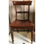 A 19th Century Norfolk mahogany bar back dining chair with dished seat on turned and reeded