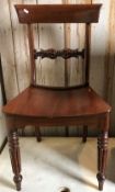 A 19th Century Norfolk mahogany bar back dining chair with dished seat on turned and reeded