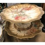 A Doulton Burslem dessert service comprising three various comports and twelve plates,