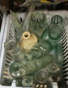 A large collection of assorted vintage glass bottles to include lemonade bottles, ink bottles, etc,