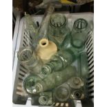 A large collection of assorted vintage glass bottles to include lemonade bottles, ink bottles, etc,