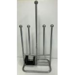 A modern iron boot rack / scraper,