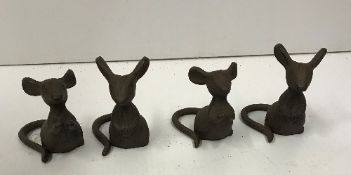 Four modern cast iron mice ornaments,