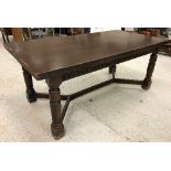 A modern oak draw leaf dining table in the 17th Century style,