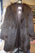 A vintage brown mink coat bearing Luxurstyle label to inside,