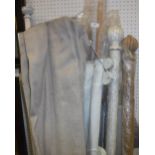 A collection of blinds and curtain poles
