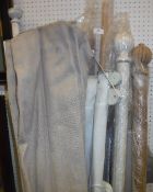 A collection of blinds and curtain poles