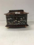 A Regency tortoiseshell veneered tea caddy inlaid in mother of pearl with chinoiserie decorated