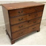 A 19th Century mahogany chest of four long graduated drawers on bracket feet with ornate brass swan