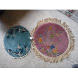 Two small circular Chinese Art Deco style rugs, one with prunus blossom decoration on a pink ground,