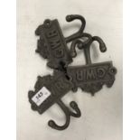 Three modern painted cast iron robe hooks inscribed "GWR"
