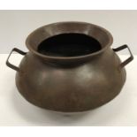 A vintage style steel two-handled handi/pot