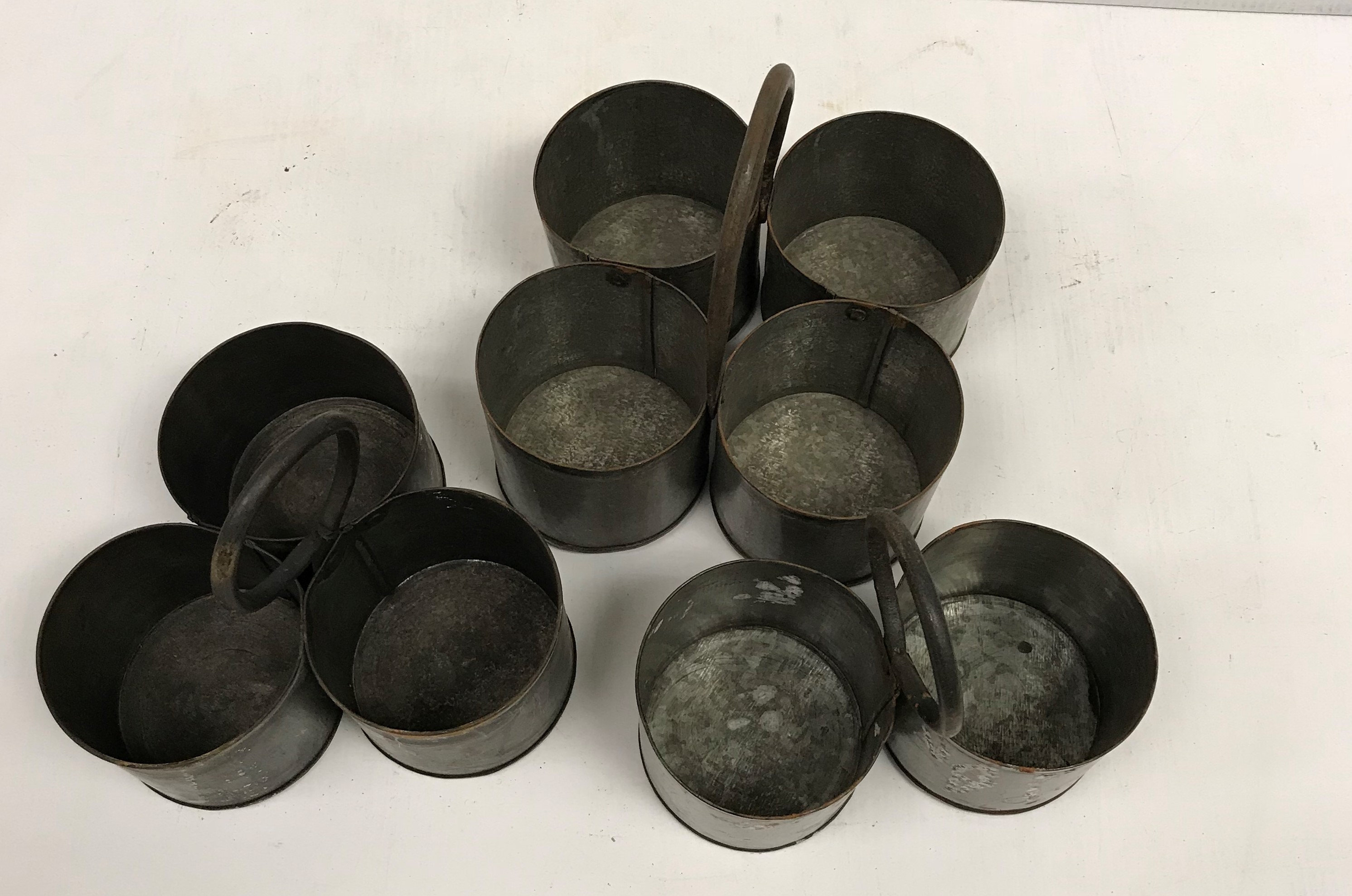 Three various galvanised spice carriers