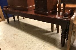 A mahogany window seat in the Victorian