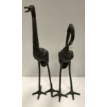 Two modern verdigris patinated bronze crane figures