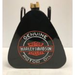 A modern painted metal triangular fuel can inscribed "Harley Davidson Motorcycles Genuine Motor