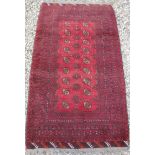 A Turkamen rug with repeating elephant f