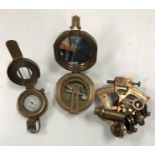 A reproduction brass marching compass, a