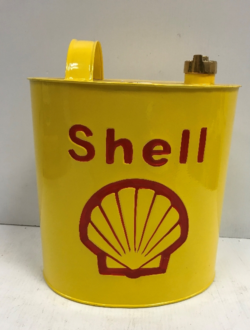 A modern painted metal fuel can inscribed "Shell" 34 cm