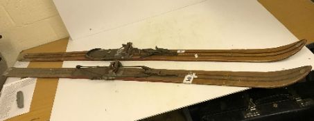 A pair of vintage wooden Elbruz skis wit