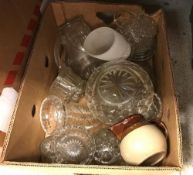 A box of assorted glassware to include j