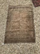 A Bokhara rug with central repeating rec