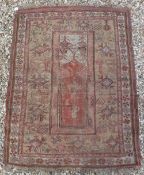 An Ushak prayer rug, the centre field wi