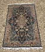 A Persian design rug with centre medalli