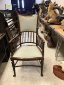 A circa 1900 mahogany framed elbow chair