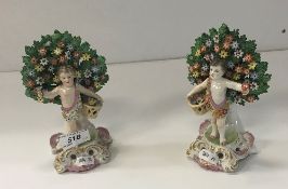 A pair of Samson bocage figures of putti