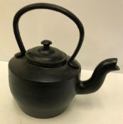 A black painted cast iron kettle 24 cm high CONDITION REPORTS no engravings on base