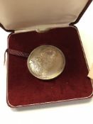 A Turks and Caicos silver medallion with