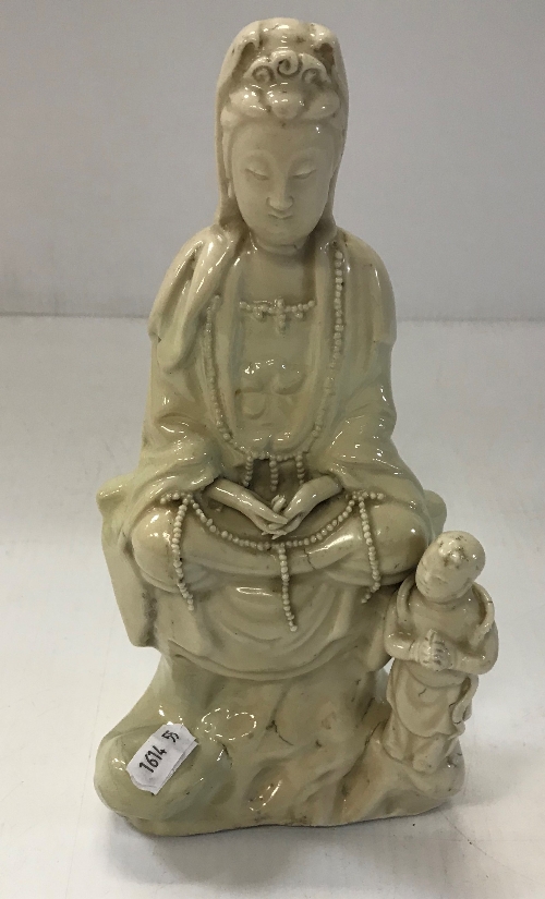 A Chinese blanc de chine figure of Guan