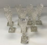 A set of eight hobnail cut glass ale flu