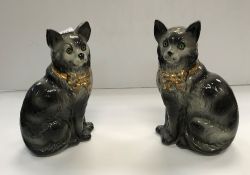 A pair of Staffordshire glazed pottery f