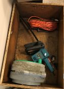 A crate containing a Black & Decker hedg