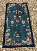 A circa 1920's Chinese carpet, the centr