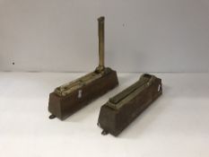 A pair of Victorian brass folding shelf