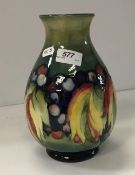 A William Moorcroft baluster shaped vase