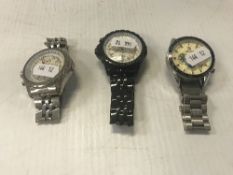 Two Breitling-style wristwatches and a T