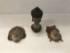 A pair of Indonesian carved and painted