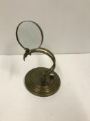 A modern brass table magnifying glass, 2