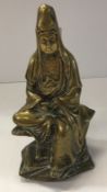 A Chinese bronze figure of Guan Yin seat