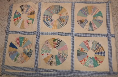 An early 20th Century patchwork quilt of