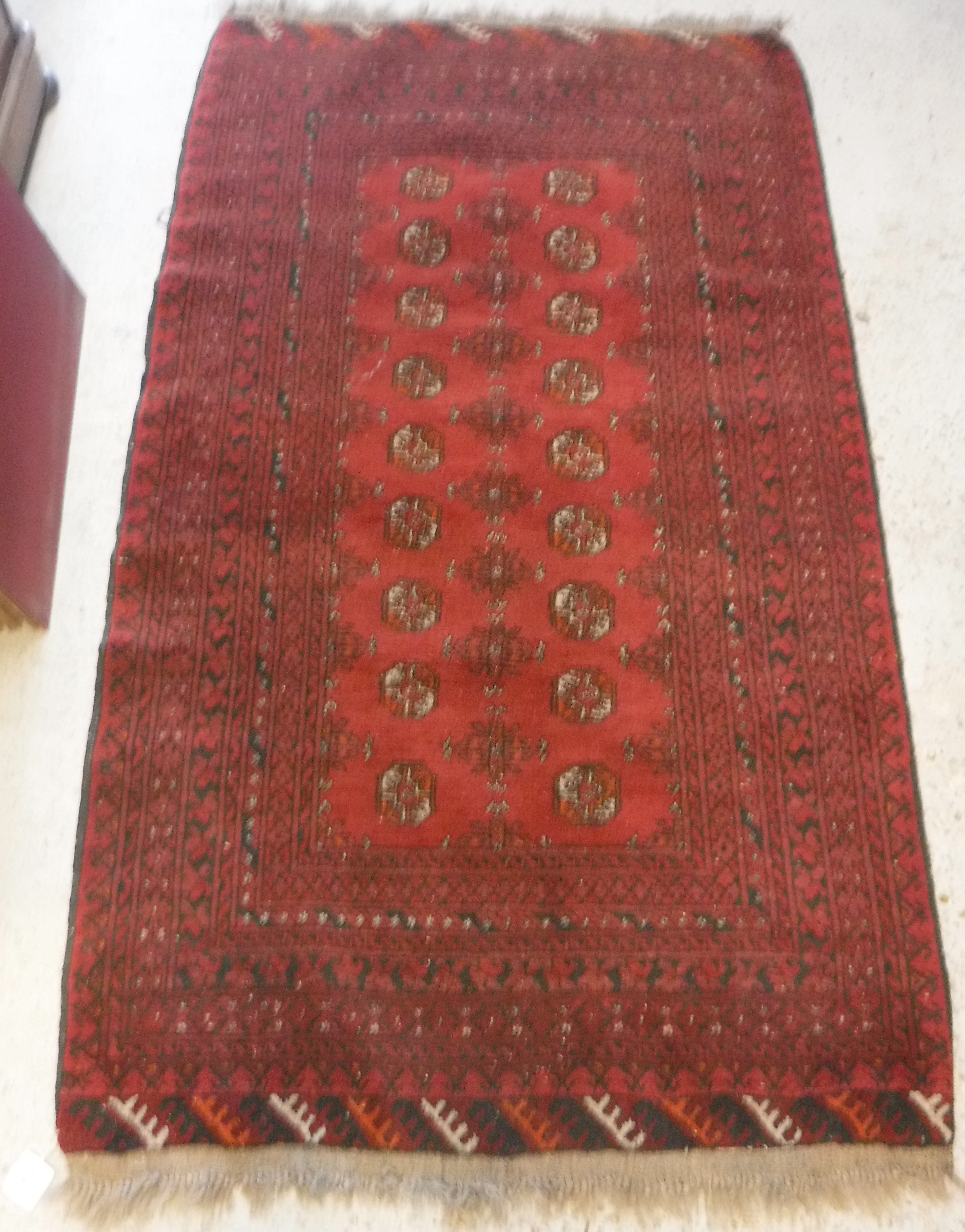 A Turkamen rug with repeating elephant f